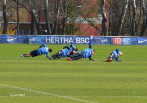 Some interesting stretching exercises being done by Hertha players at Schenckendorffplatz